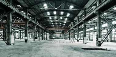 An empty brownfield facility that needs automation.